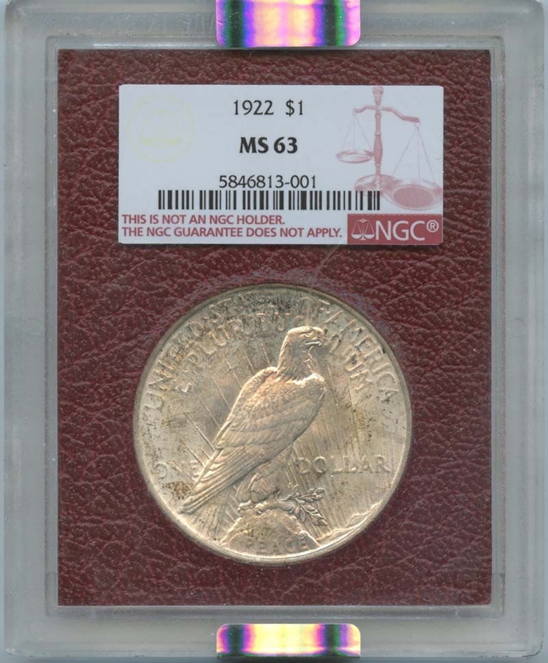 1922 Peace Dollar S$1 NGC MS63 Uncirculated Philadelphia Coin: 1922 Peace Dollar S$1 NGC MS63 Uncirculated Philadelphia Coin This 1922 Peace Dollar is a remarkable addition for any numismatic enthusiast. Graded MS63 by NGC, this coin is uncirculated and showcases