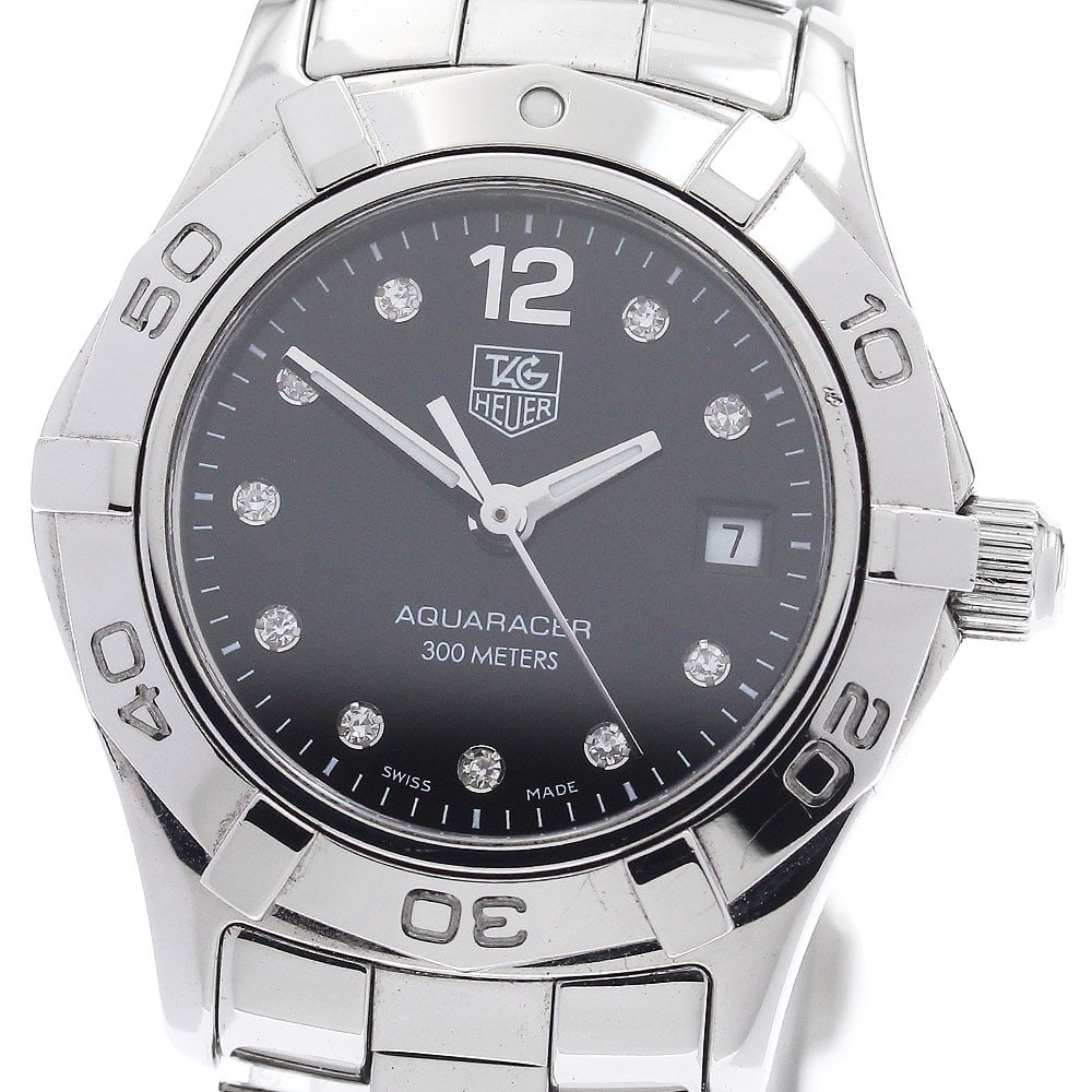 TAG Heuer Aquaracer Quartz Women's Stainless Steel Watch WAF141C: TAG Heuer Aquaracer Quartz Women's Stainless Steel Watch WAF141C This TAG Heuer Aquaracer WAF141C is a pre-owned women's wristwatch featuring a stainless steel case and band with a black dial. The wat