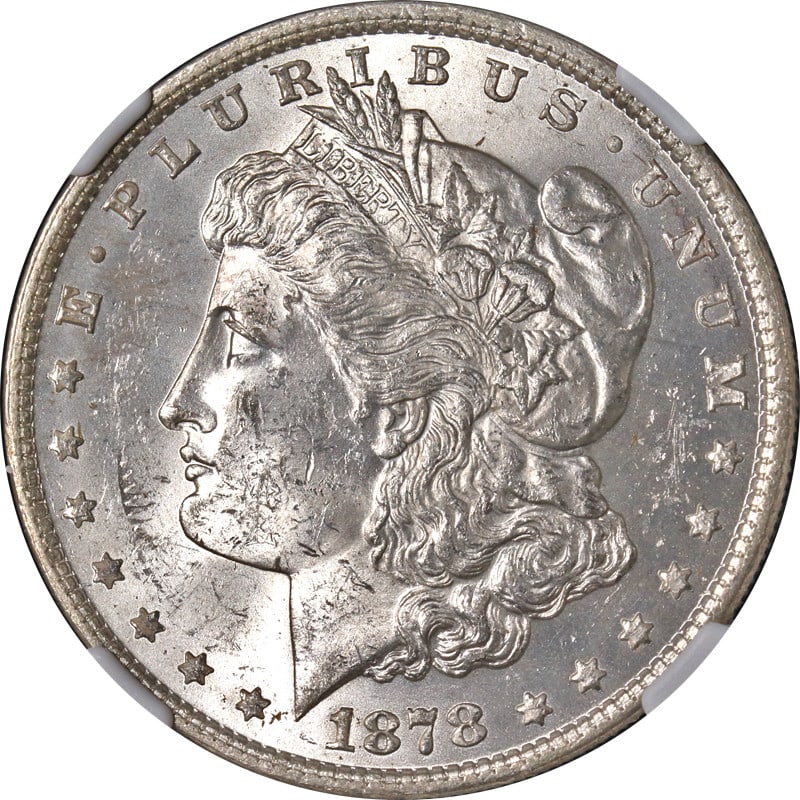 1878-P 7TF Rev 79 Morgan Silver Dollar NGC MS61 Uncirculated Silver Coin: 1878-P 7TF Rev 79 Morgan Silver Dollar NGC MS61 Uncirculated Silver Coin This stunning 1878-P 7TF Rev 79 Morgan Silver Dollar is a remarkable piece for collectors, offering excellent eye appeal with i