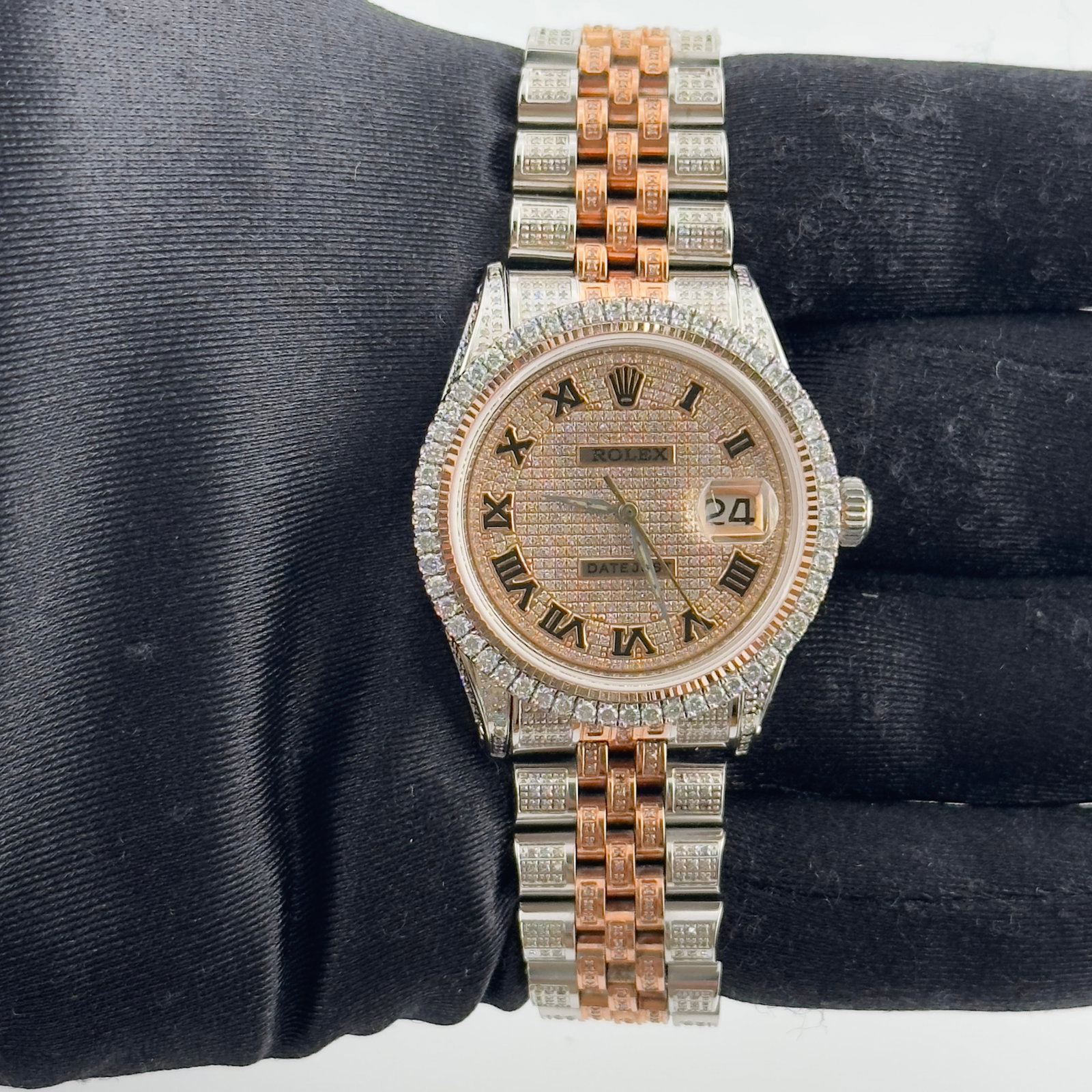 Rolex Datejust Ref 1601 Mens Watch With Aftermarket Iced Out Roman Dial And Diamond Bracelet: Rolex Datejust Ref 1601 Mens Watch With Aftermarket Iced Out Roman Dial And Diamond Bracelet This Rolex Datejust Ref 1601 features an aftermarket iced-out Roman numeral dial, a diamond bezel, and an a