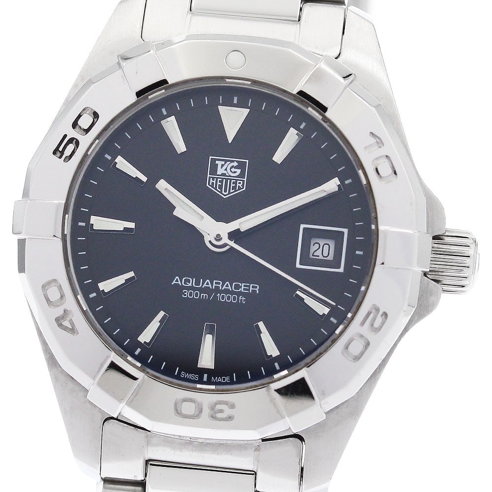 TAG Heuer Aquaracer Black Dial Quartz Ladies Watch WAY1410.BA0920: TAG Heuer Aquaracer Black Dial Quartz Ladies Watch WAY1410.BA0920 This TAG Heuer Aquaracer Date Quartz women's wristwatch features a stainless steel case and bracelet with a black dial. Powered by a r