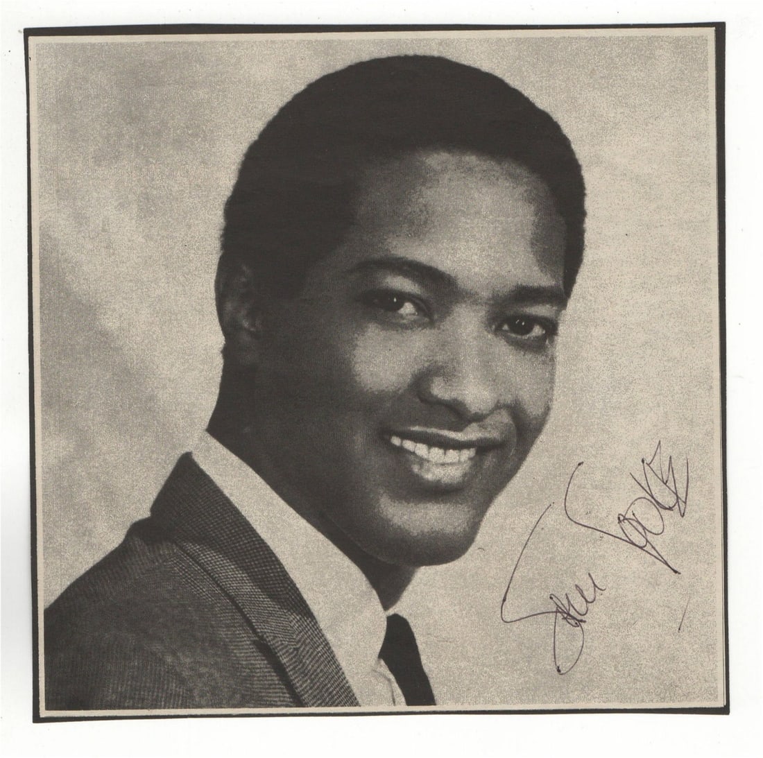 Sam Cooke Autographed Newspaper Photo JSA Certified King of Soul: Sam Cooke Autographed Newspaper Photo JSA Certified King of Soul This is an original autographed newspaper photo of Sam Cooke, known as the King of Soul. The photograph measures approximately 6 3/8 x 