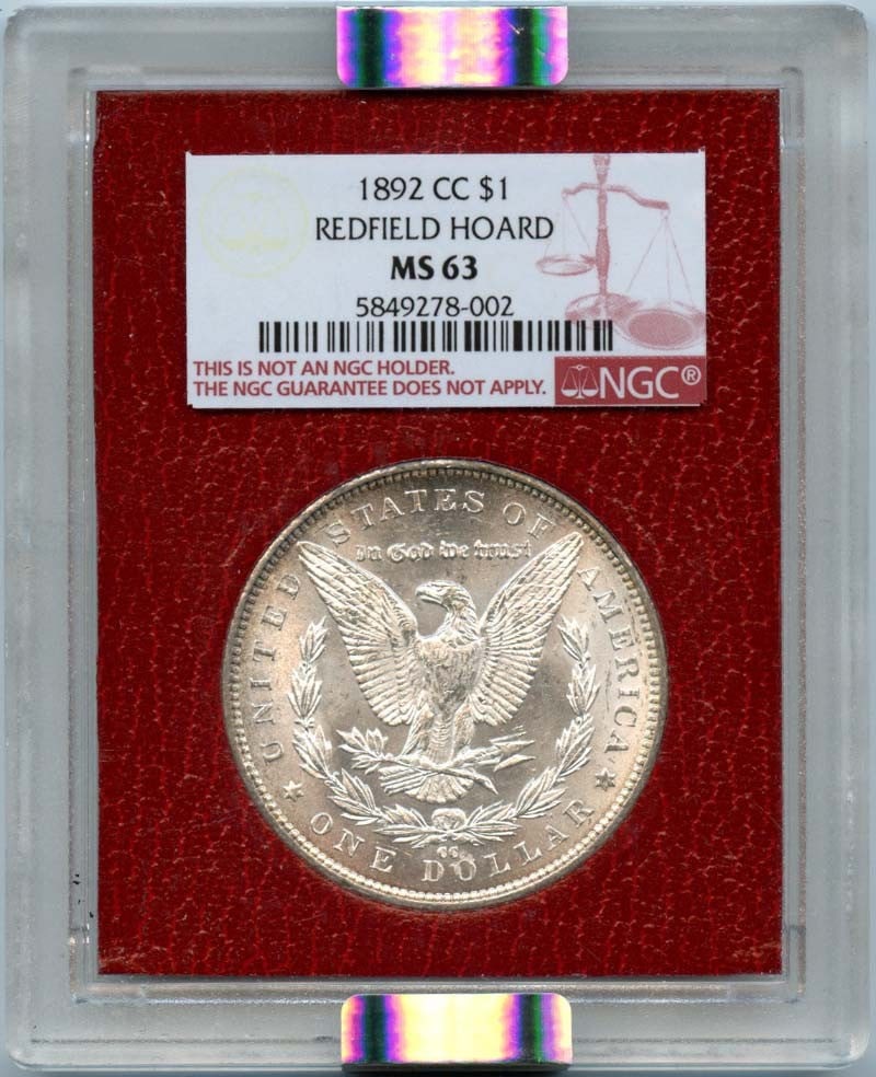 1892-CC Morgan Dollar Redfield Hoard NGC MS63 Uncirculated: 1892-CC Morgan Dollar Redfield Hoard NGC MS63 Uncirculated This 1892-CC Morgan Dollar is a remarkable addition to any numismatic collection. Graded MS63 by NGC, this uncirculated coin showcases the st