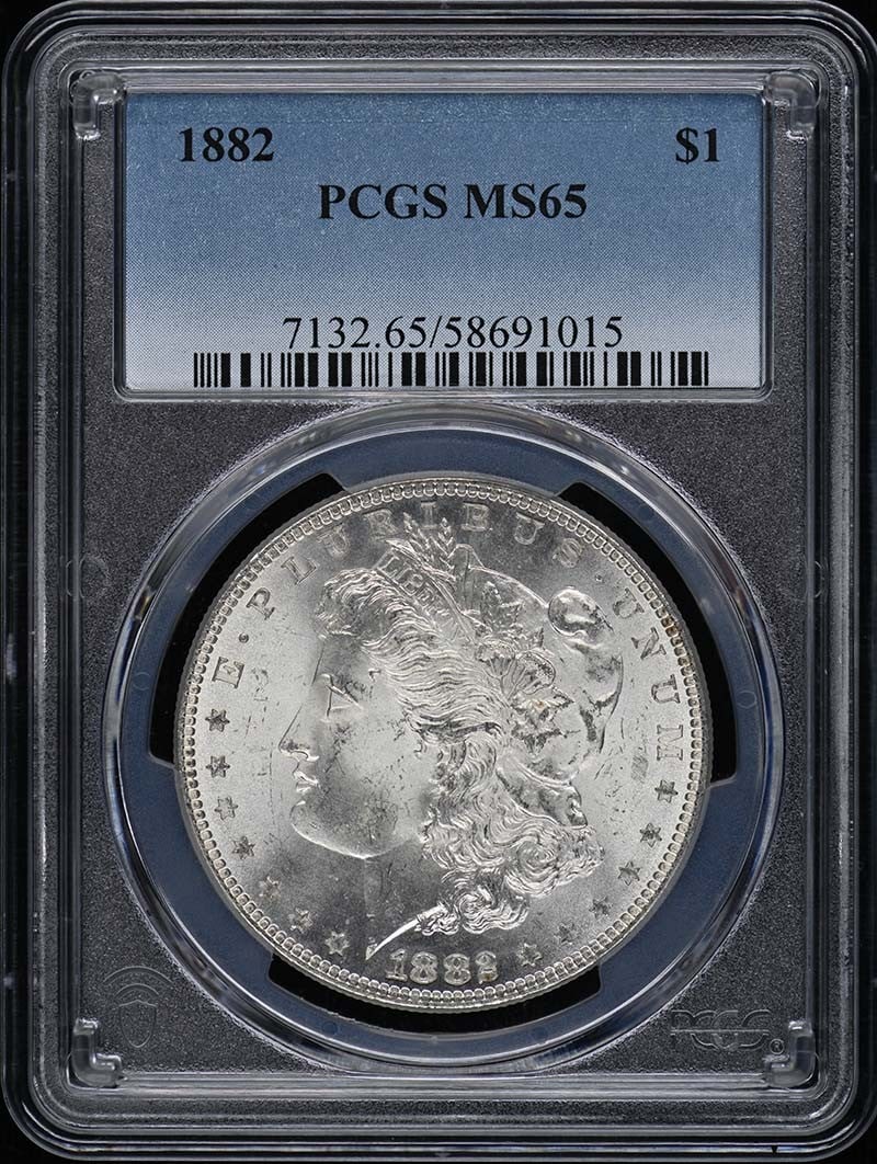 PCGS MS65 1882 Morgan Silver Dollar: PCGS MS65 1882 Morgan Silver Dollar This 1882 Morgan Dollar is graded MS65 by PCGS, indicating a high-quality, uncirculated coin. Minted in Philadelphia, it features the classic Morgan Dollar design a