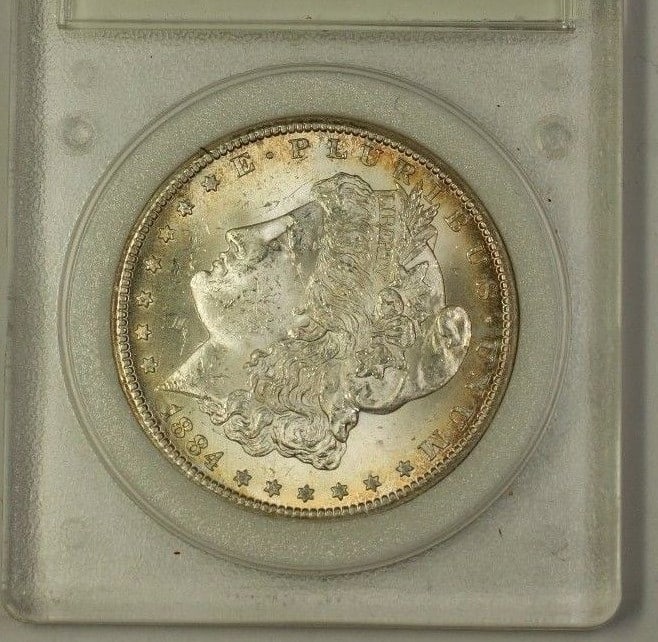 Encapsulated 1884 Carson City Morgan Silver Dollar Uncirculated $1 Coin: Encapsulated 1884 Carson City Morgan Silver Dollar Uncirculated $1 Coin This 1884-CC Morgan Silver Dollar is an uncirculated collectible coin minted in Carson City. The coin is made of silver and has 