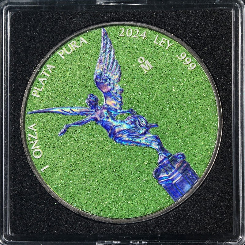 2024 Mexico 1 Ounce Silver Libertad Electric Holo Green Dust Coin: 2024 Mexico 1 Ounce Silver Libertad Electric Holo Green Dust Coin Discover the stunning 2024 Mexico 1 Ounce Silver Libertad, featuring a captivating blue electric holo green dust finish. This uncircul