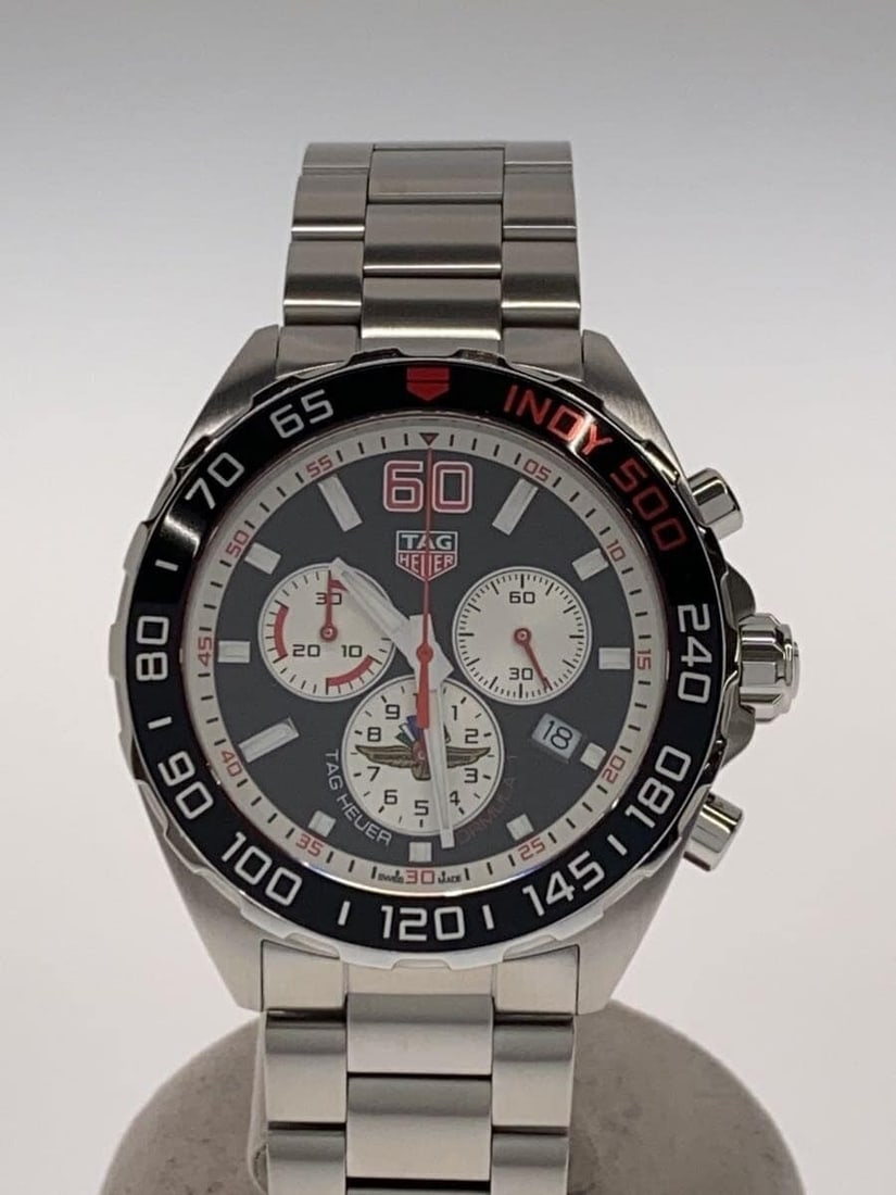 TAG Heuer Formula 1 Men's Quartz Wristwatch CAZ101V: TAG Heuer Formula 1 Men's Quartz Wristwatch CAZ101V This TAG Heuer Formula 1 Quartz men's wristwatch features a classic round case with a 4.7 cm diameter and a 1.3 cm thickness. The dial measures 3.1 