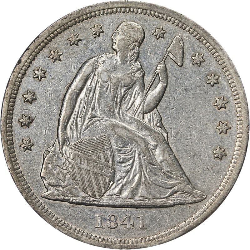 1841 Silver Seated Liberty Dollar Choice XF AU: 1841 Silver Seated Liberty Dollar Choice XF AU This 1841 Seated Liberty Dollar is a circulated coin with a choice XF/AU grade, showcasing attractive eye appeal and a well-defined strike. The coin feat