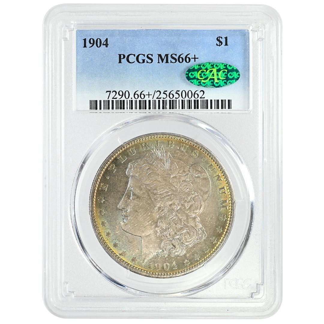 PCGS CAC MS66 Plus 1904 Morgan Silver Dollar: PCGS CAC MS66 Plus 1904 Morgan Silver Dollar This 1904 Morgan Dollar is composed of silver and was minted in Philadelphia. It is graded MS66+ by PCGS and also carries CAC certification. The coin is un