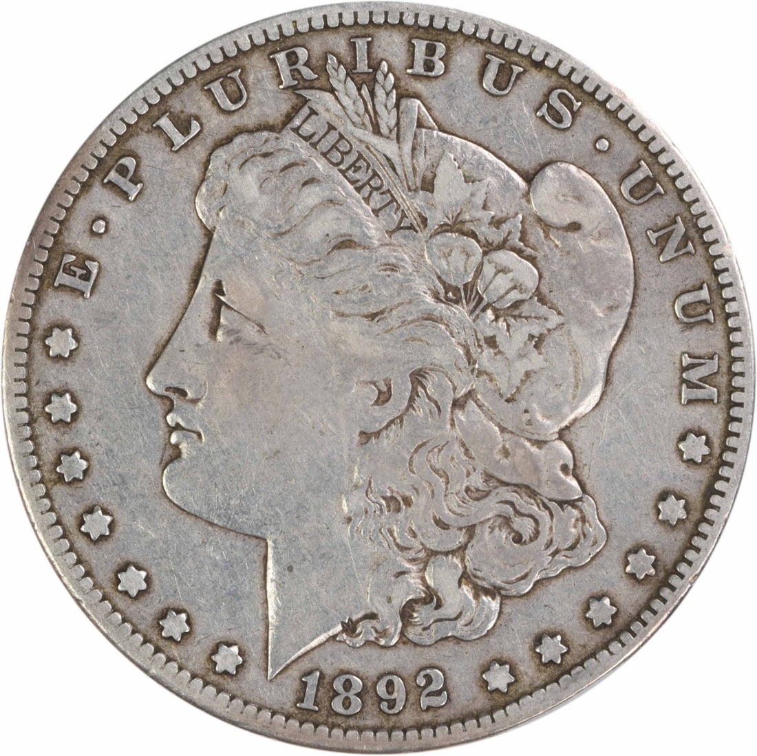 San Francisco Mint 1892 Morgan Dollar VF 90 Percent Silver Uncertified: San Francisco Mint 1892 Morgan Dollar VF 90 Percent Silver Uncertified This 1892-S Morgan Silver Dollar is a circulated coin featuring a composition of 90% silver and 10% copper. Minted in San Francis