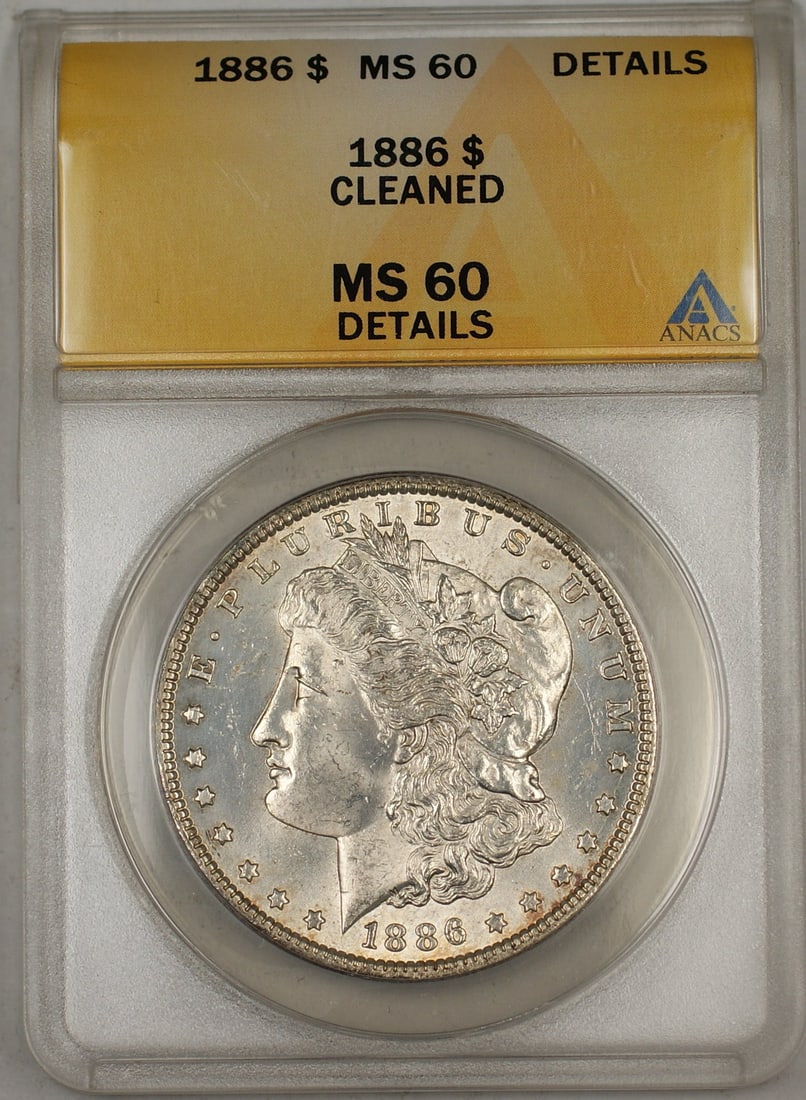 1886 Philadelphia Morgan Dollar Silver Coin ANACS MS-60 Details Cleaned: 1886 Philadelphia Morgan Dollar Silver Coin ANACS MS-60 Details Cleaned This is an 1886 Morgan Silver Dollar graded MS-60 Details by ANACS, noted as having been cleaned. The coin was minted in Philade