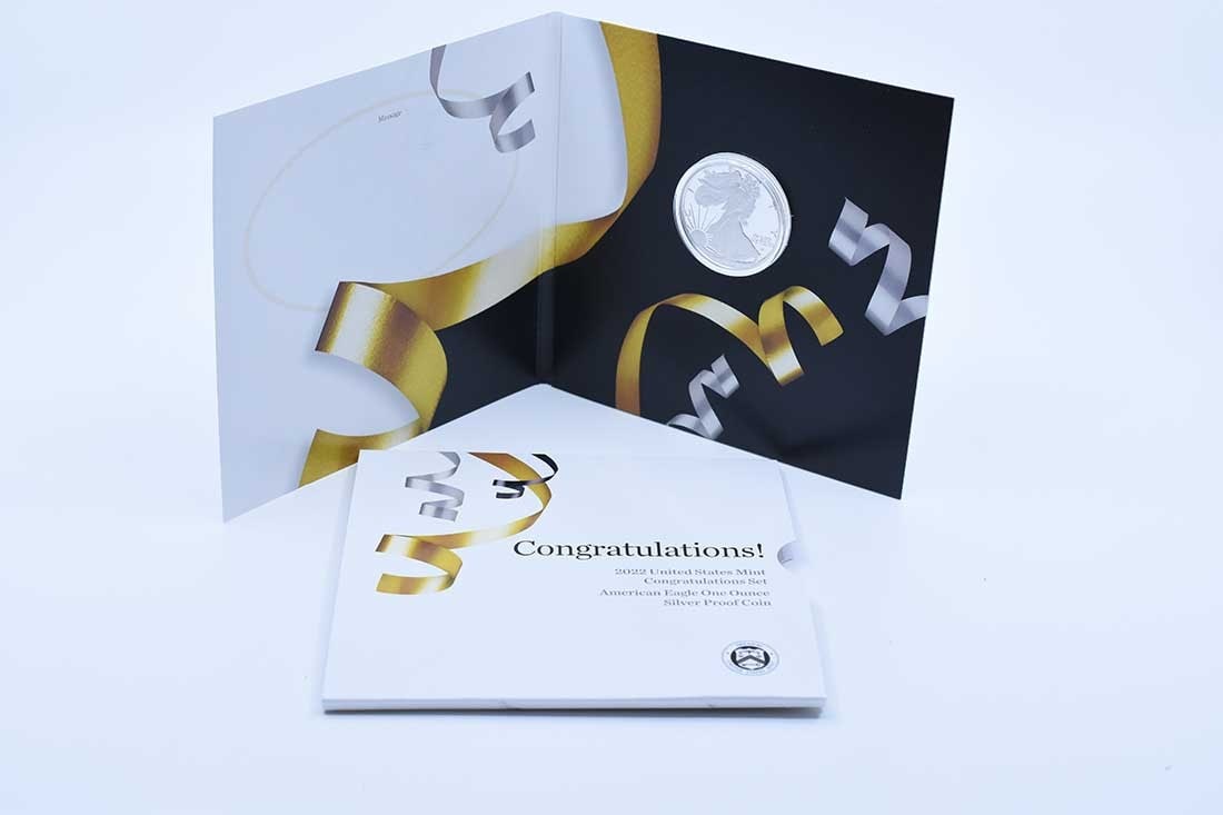 2022 Proof Silver Eagle in Congratulations Set: 2022 Proof Silver Eagle in Congratulations Set This 2022 United States Mint Congratulations Set features a $1 American Proof Silver Eagle coin. Struck in proof quality, the coin contains 1 oz of 99.93