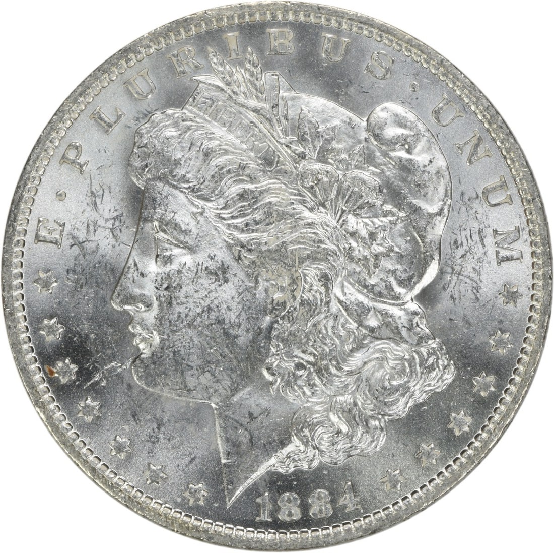 1884-O Silver Dollar Morgan Type Brilliant Uncirculated Uncertified: 1884-O Silver Dollar Morgan Type Brilliant Uncirculated Uncertified This is an 1884-O Morgan Silver Dollar from the United States, featuring brilliant uncirculated (BU) condition. The coin is uncertif