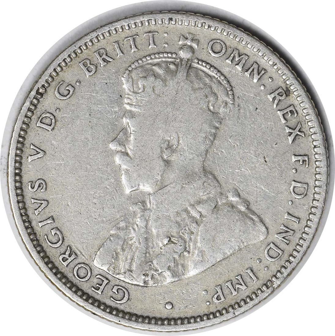 1933 Silver One Shilling Coin from Australia KM26 Uncertified F Grade: 1933 Silver One Shilling Coin from Australia KM26 Uncertified F Grade This 1933 Australia 1 Shilling coin is composed of silver and has been circulated. It is identified as KM26 and graded as F (Fine)