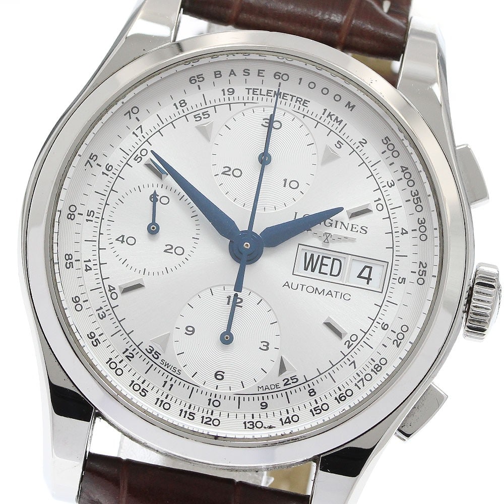 Longines Heritage 1954 Men's Chronograph Day-Date Watch: Longines Heritage 1954 Men's Chronograph Day-Date Watch This is a pre-owned Longines Heritage 1954 Chronograph Day-Date men's wristwatch, crafted in Switzerland. The watch features a chronograph and d