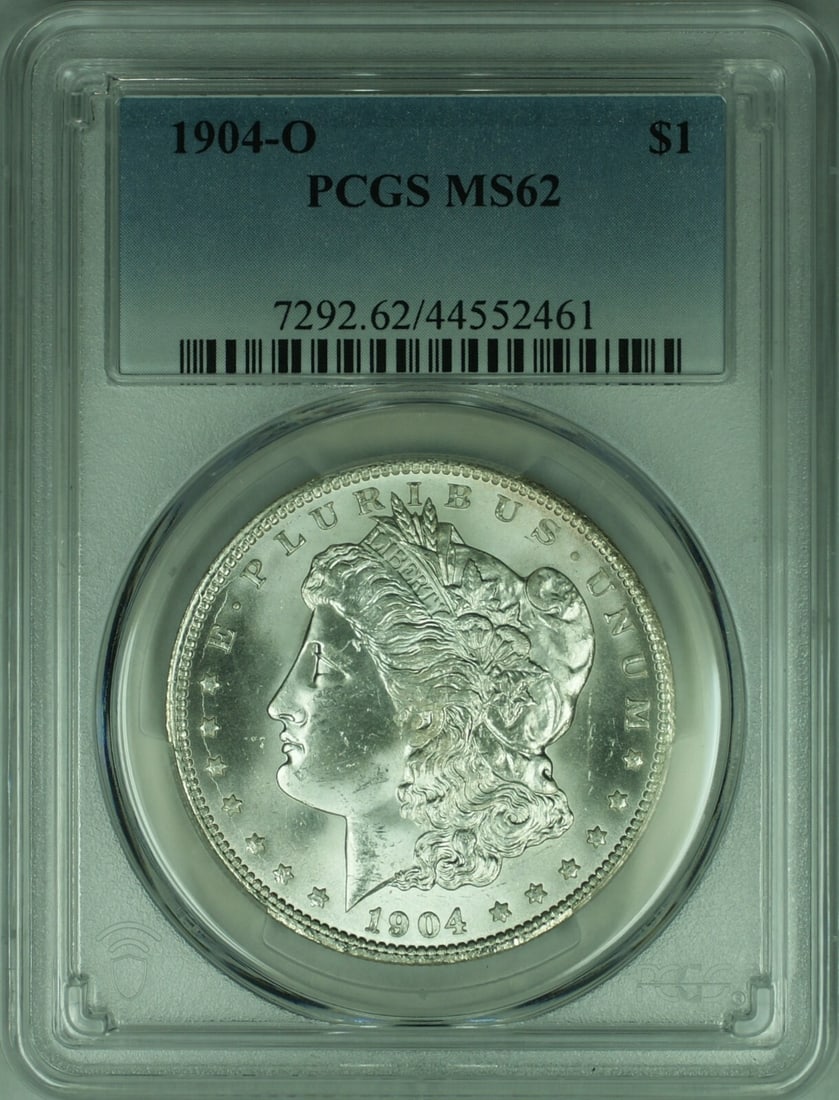 PCGS MS-62 1904-O Morgan Dollar Silver $1 New Orleans Die Break: PCGS MS-62 1904-O Morgan Dollar Silver $1 New Orleans Die Break This is a 1904-O Morgan Silver Dollar coin minted in New Orleans. Certified by PCGS with a grade of MS-62, this uncirculated coin is com
