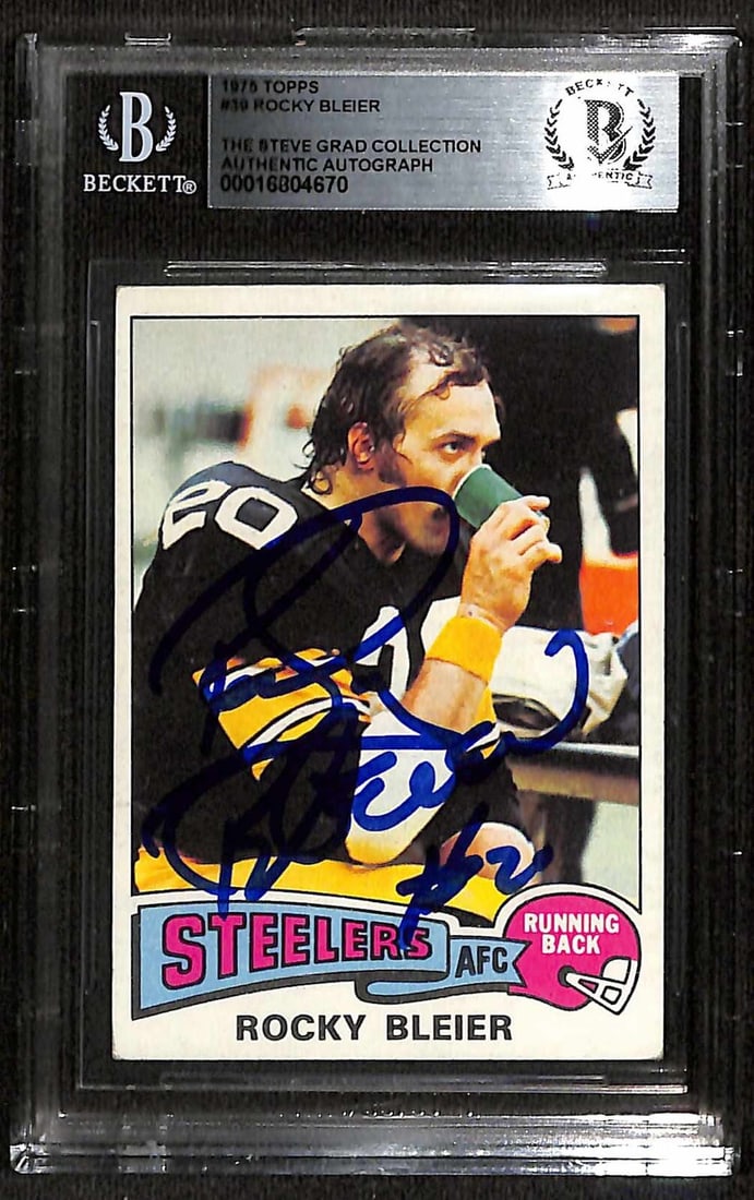 Rocky Bleier Signed 1975 Topps #39 Rookie Card Beckett Authenticated: Rocky Bleier Signed 1975 Topps #39 Rookie Card Beckett Authenticated This is an autographed 1975 Topps #39 rookie card featuring Rocky Bleier, a legendary member of the Pittsburgh Steelers and Pro Foo