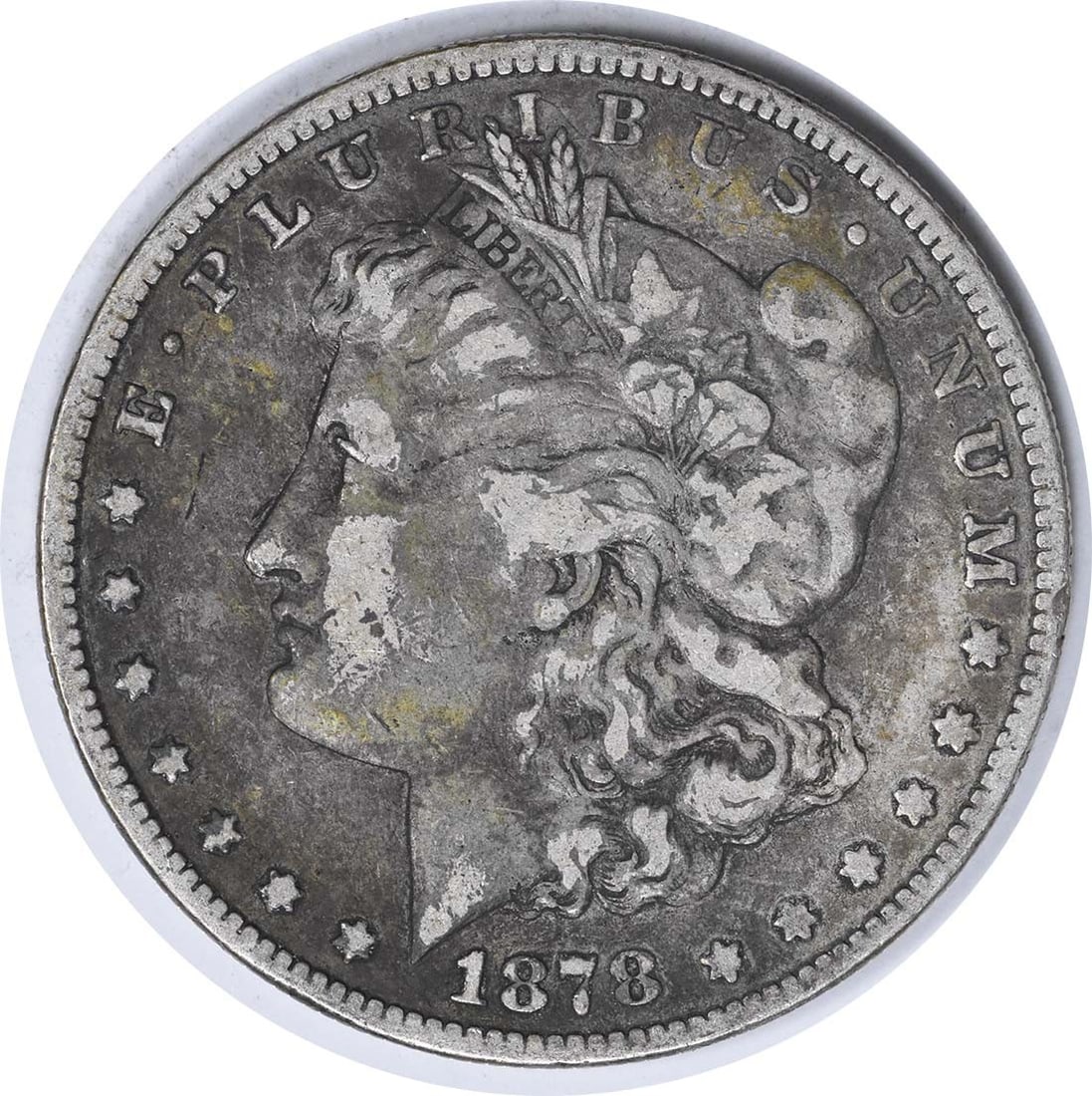 1878-S VAM 56 Morgan Dollar Silver VF Uncertified Coin: 1878-S VAM 56 Morgan Dollar Silver VF Uncertified Coin This 1878-S VAM 56 Morgan Dollar features the long arrow shaft variety, showcasing the iconic design by George T. Morgan. With a composition of 9