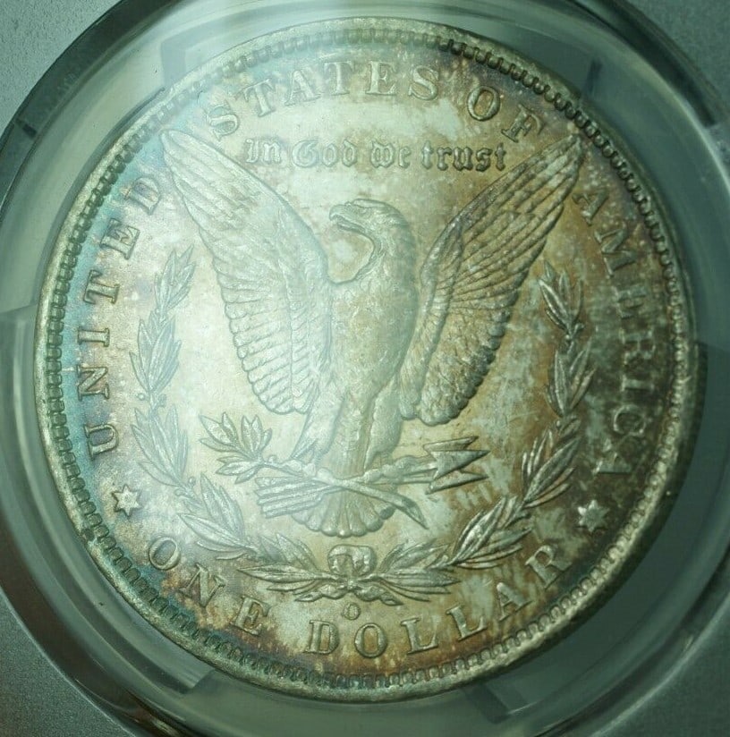 PCGS MS64 1887-O Morgan silver dollar: PCGS MS64 1887-O Morgan silver dollar This is an 1887-O Morgan Silver Dollar graded MS-64 by PCGS. Minted in New Orleans, this uncirculated coin is composed of silver and features the classic Morgan D