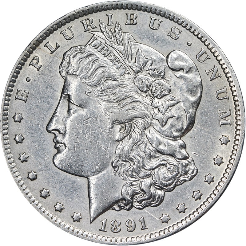 1891 CC Morgan Dollar Silver Nice Strike AU Details: 1891 CC Morgan Dollar Silver Nice Strike AU Details This 1891-CC Morgan Silver Dollar features attractive eye appeal and a well-defined strike. The coin is graded as AU Details, indicating it retains 