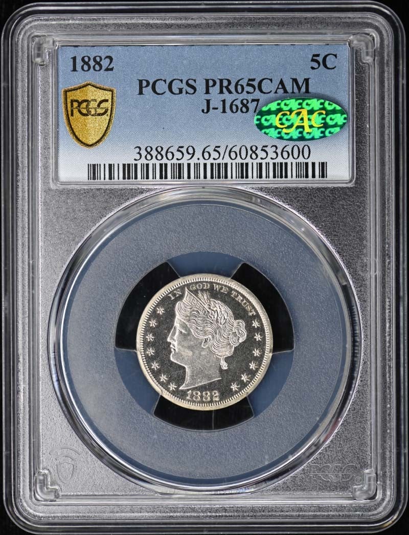 1882 Liberty Head Nickel PCGS PR65CAM CAC Pattern J-1687: 1882 Liberty Head Nickel PCGS PR65CAM CAC Pattern J-1687 This is an 1882 5-cent J-1687 pattern coin, graded PR65 by PCGS and designated as Cameo (CAM). The coin is uncirculated and features a proof st