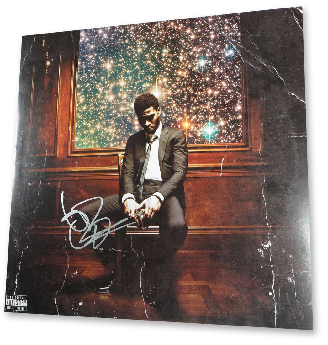 Kid Cudi Signed Album Cover Man on the Moon Beckett Authenticated: Kid Cudi Signed Album Cover Man on the Moon Beckett Authenticated This is an original autographed record album cover of Kid Cudi's "Man on the Moon," authenticated by Beckett Authentication Services. 