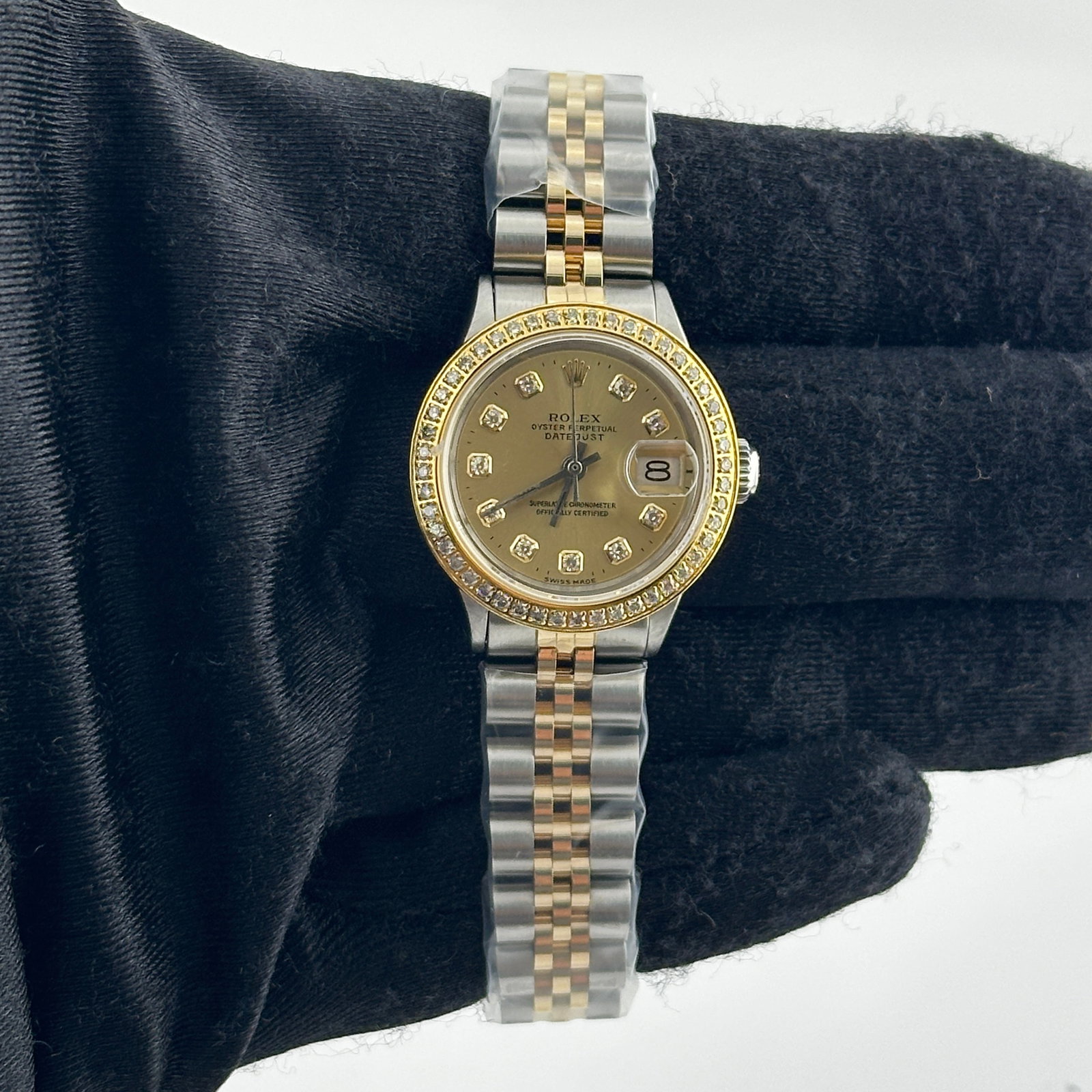 Ladies Rolex 6517 Datejust Aftermarket Diamond Champagne Dial Jubilee Bracelet: Ladies Rolex 6517 Datejust Aftermarket Diamond Champagne Dial Jubilee Bracelet This ladies' Rolex Datejust features an aftermarket champagne diamond dial and an aftermarket Jubilee bracelet. The watch
