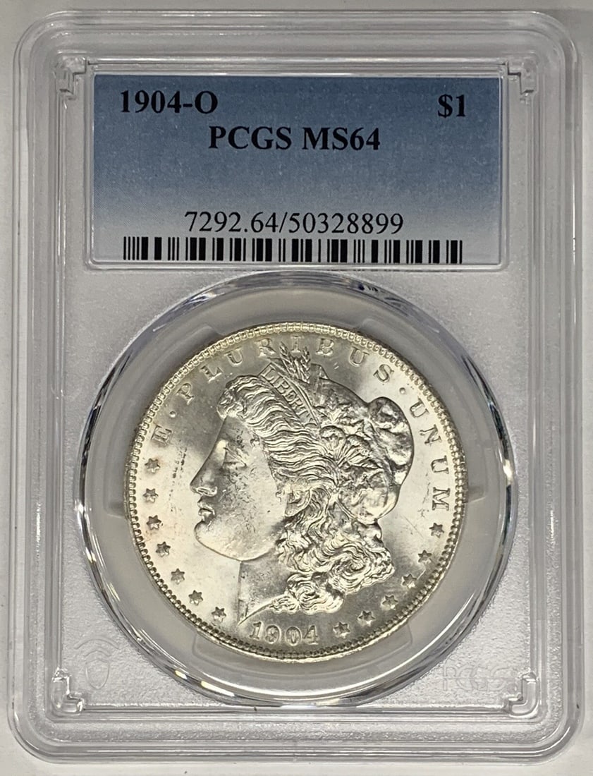 PCGS MS 64 Certified 1904-O Morgan Dollar Silver $1 Coin: PCGS MS 64 Certified 1904-O Morgan Dollar Silver $1 Coin This is a 1904-O Morgan Silver Dollar coin from the United States. It is uncirculated and graded MS 64 by PCGS, indicating a high level of pres