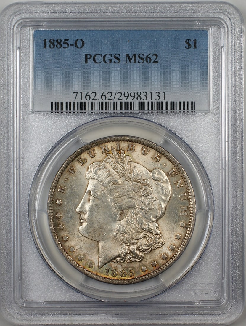 PCGS MS62 1885-O Morgan Silver Dollar Toned: PCGS MS62 1885-O Morgan Silver Dollar Toned This is an 1885-O Morgan Silver Dollar graded MS-62 by PCGS. The coin is uncirculated and features attractive toning. Struck at the New Orleans Mint, it is 