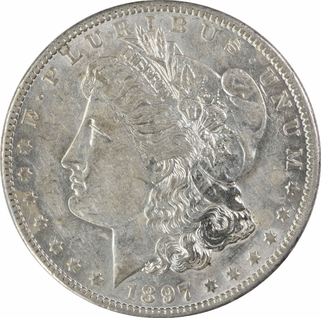 1897-O Morgan Silver Dollar AU Uncertified 90% Silver Coin: 1897-O Morgan Silver Dollar AU Uncertified 90% Silver Coin This 1897-O Morgan Silver Dollar is a captivating piece of numismatic history. Graded as AU (Almost Uncirculated), this coin showcases the ex