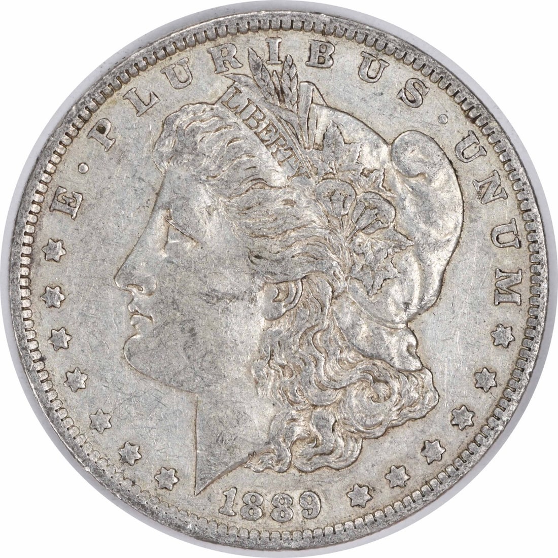 1889-O Morgan Silver Dollar AU Uncertified New Orleans Coin: 1889-O Morgan Silver Dollar AU Uncertified New Orleans Coin This 1889-O Morgan Silver Dollar is an exquisite example of American numismatic history. Struck in 90% silver and 10% copper, this coin feat