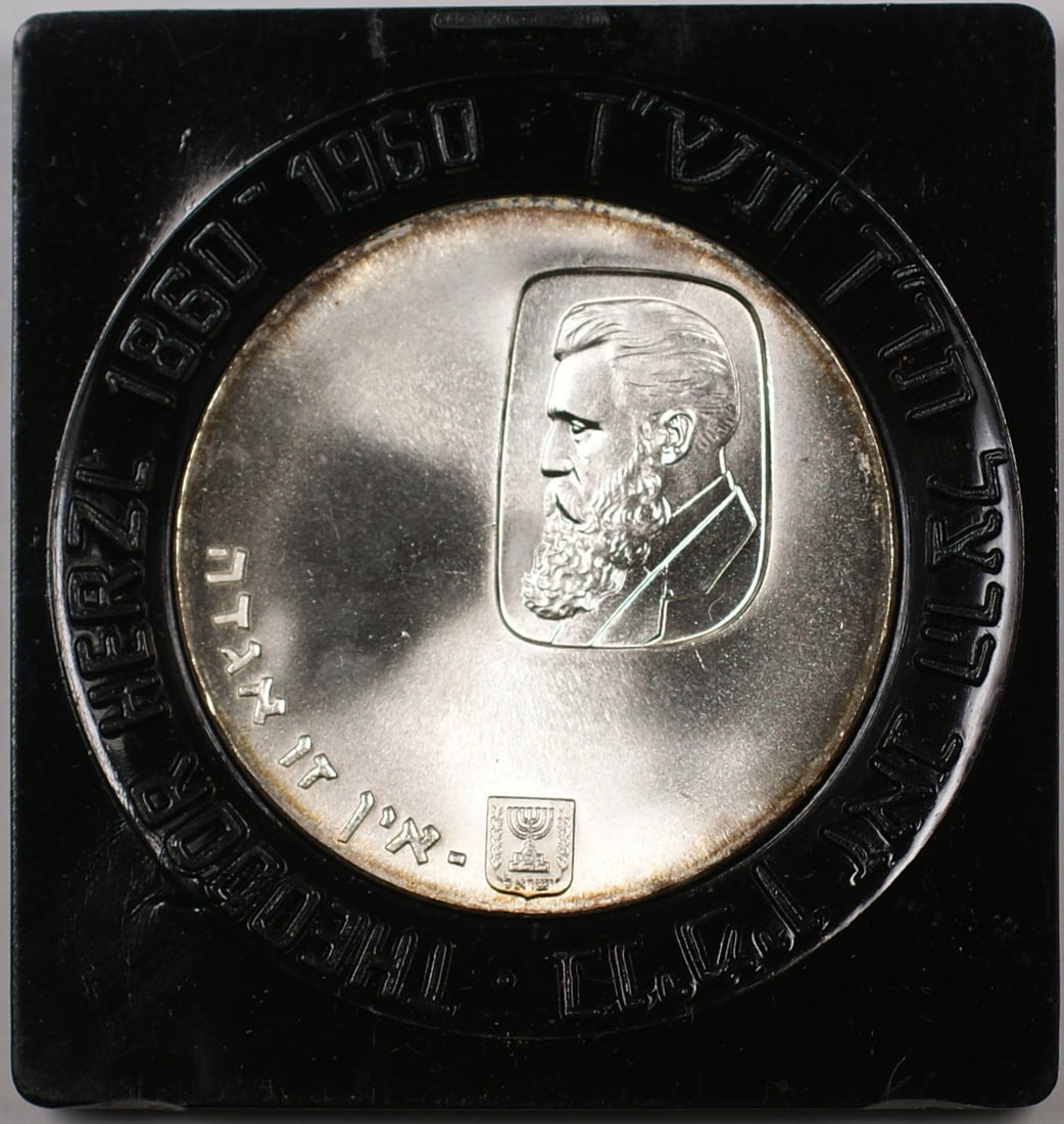 Uncirculated 1960 Israel 5 Lirot Silver Theodor Herzl Coin in Original Case: Uncirculated 1960 Israel 5 Lirot Silver Theodor Herzl Coin in Original Case This 1960 Israel 5 Lirot Theodor Herzl commemorative coin is crafted in silver with a fineness of 0.9. The coin is uncircula