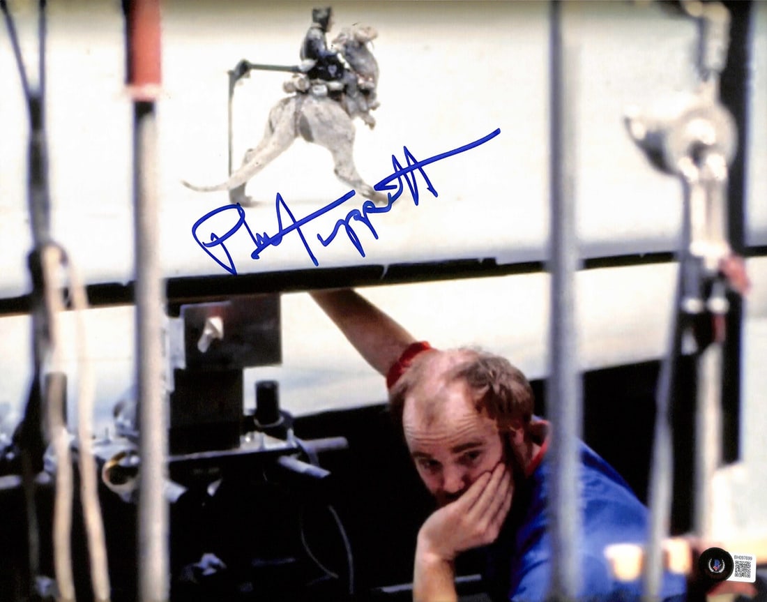 Phil Tippett Signed 11x14 SFX Photo From The Empire Strikes Back Beckett Authenticated: Phil Tippett Signed 11x14 SFX Photo From The Empire Strikes Back Beckett Authenticated This is an original 11x14-inch color photograph signed by ILM SFX artist Phil Tippett, captured during the filmin