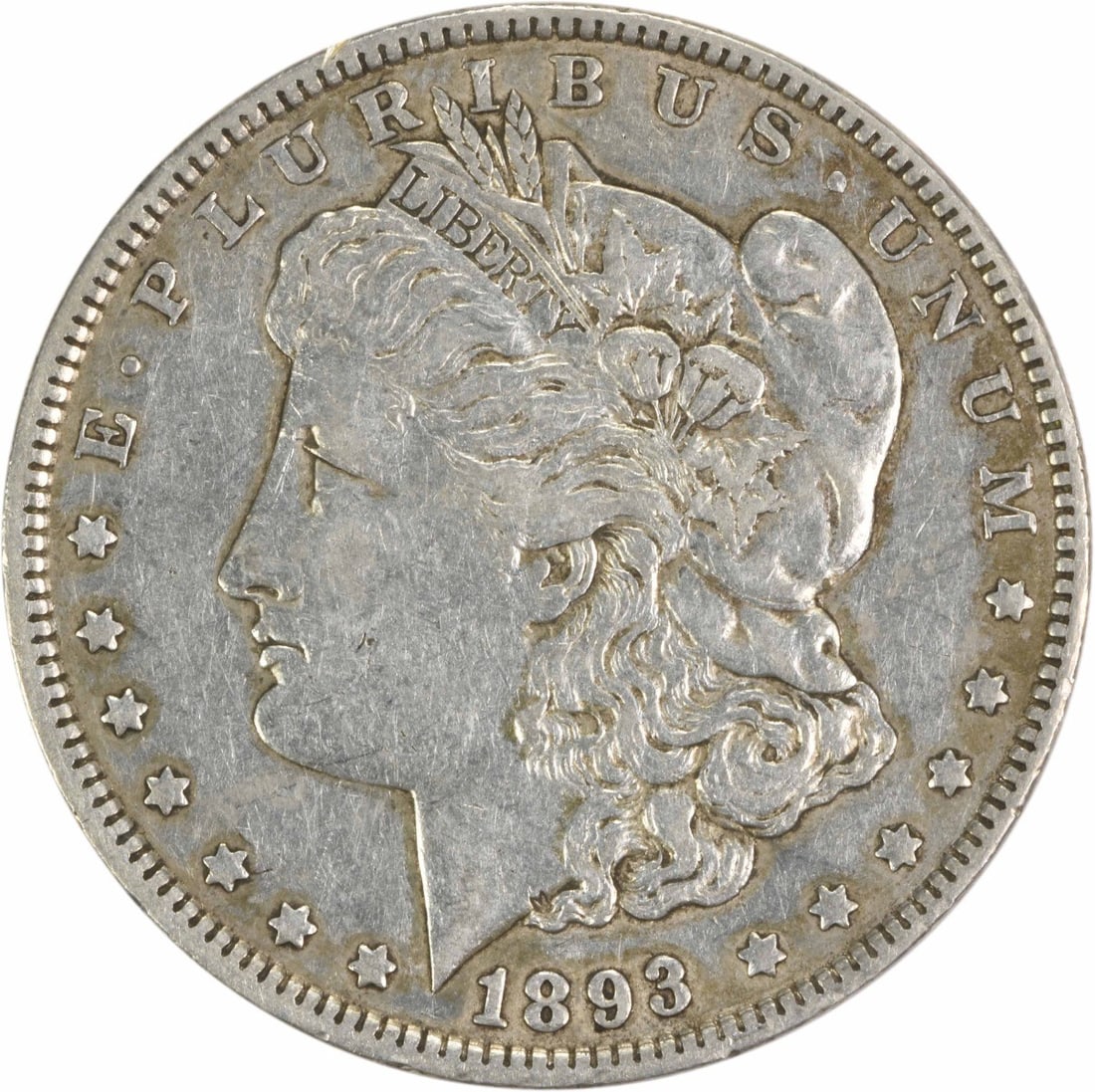 1893 Morgan Silver Dollar XF Uncertified 90% Silver Coin: 1893 Morgan Silver Dollar XF Uncertified 90% Silver Coin This 1893 Morgan Silver Dollar is a classic collectible coin, showcasing the artistry of designer George T. Morgan. It is a circulated piece, g