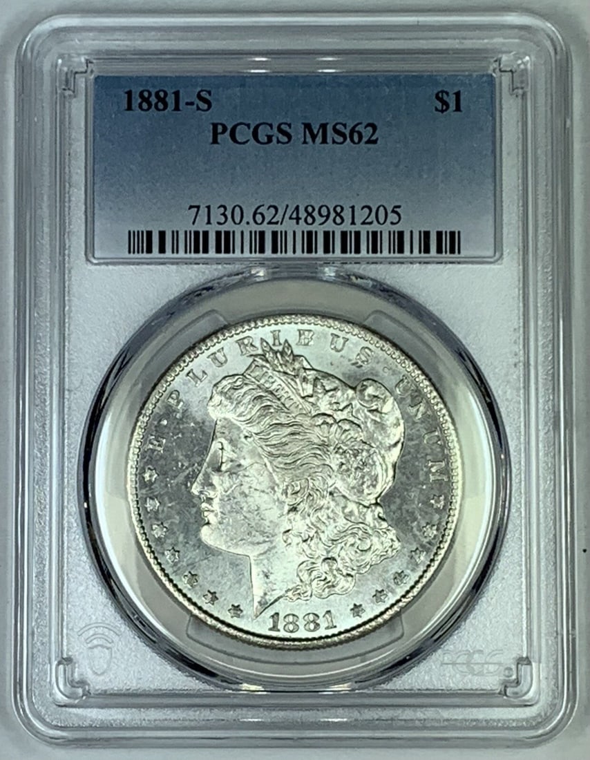 PCGS MS 62 Certified 1881-S Morgan Silver Dollar Coin: PCGS MS 62 Certified 1881-S Morgan Silver Dollar Coin This 1881-S Morgan Silver Dollar is graded MS 62 by PCGS. Struck in the United States, this uncirculated coin is composed of silver and features t