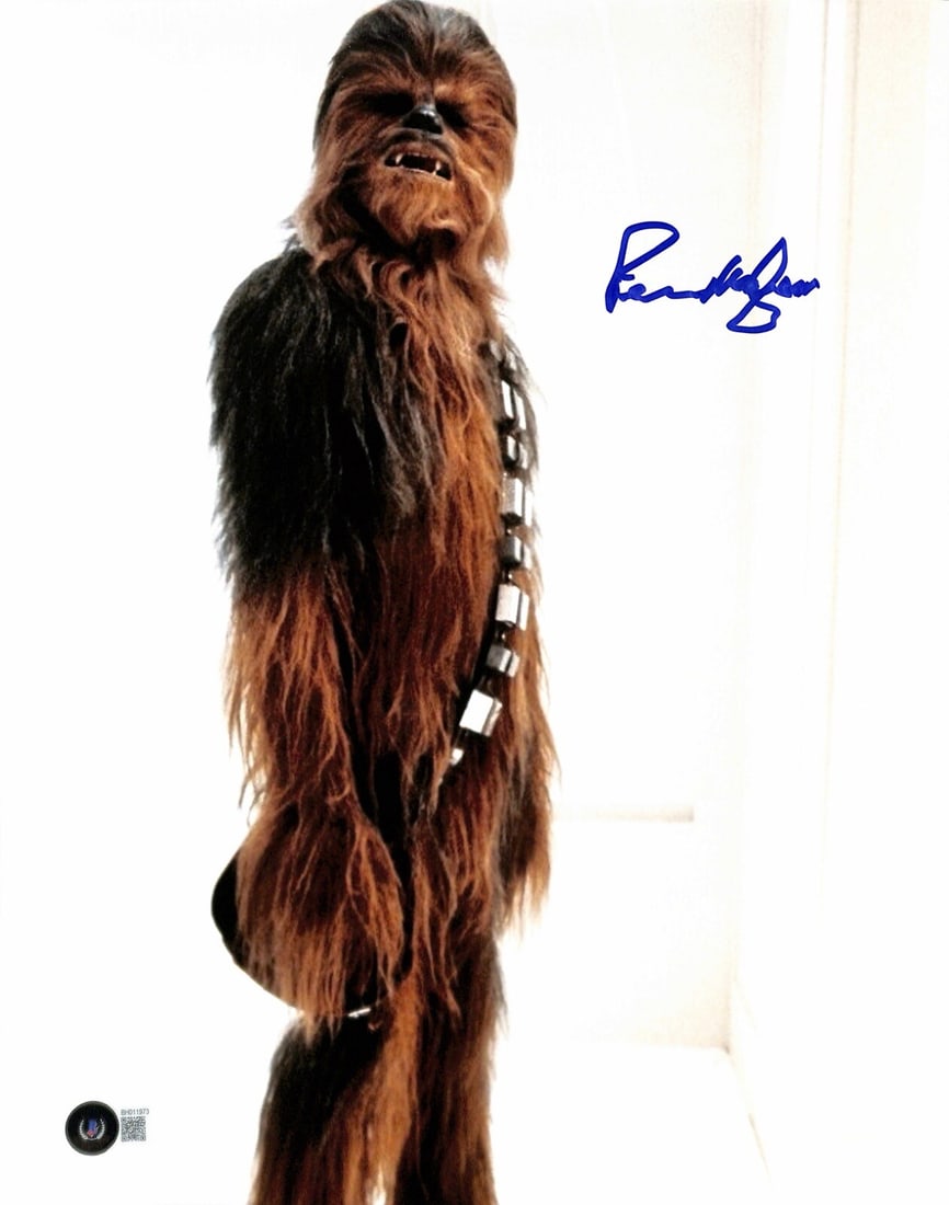 11x14 Beckett signed Peter Mayhew Chewbacca photo: 11x14 Beckett signed Peter Mayhew Chewbacca photo This is an 11x14 photograph featuring Peter Mayhew as Chewbacca in the Star Wars: The Empire Strikes Back Bespin Trap scene. The photo is hand-signed 