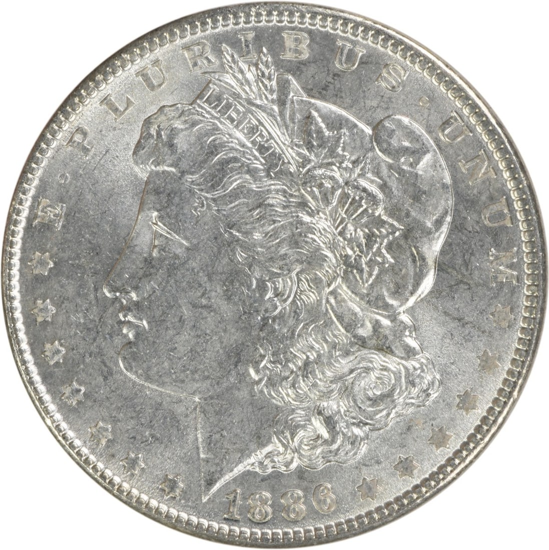 1886 Choice BU Morgan Dollar Uncirculated Silver Coin Uncertified: 1886 Choice BU Morgan Dollar Uncirculated Silver Coin Uncertified This 1886 Morgan Silver Dollar is a Choice Brilliant Uncirculated (BU) coin. Struck in silver, it features no mint mark and is uncerti