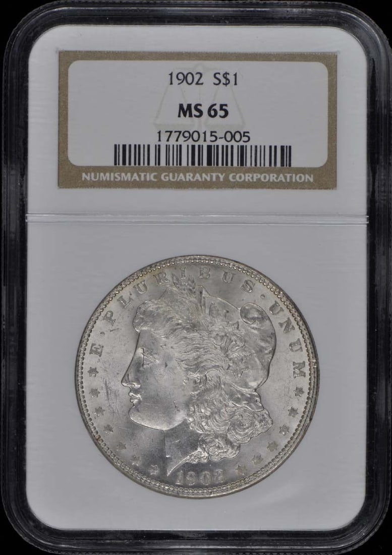 1902 Morgan Dollar NGC MS65 Uncirculated Coin: 1902 Morgan Dollar NGC MS65 Uncirculated Coin This 1902 Morgan Dollar is certified by NGC with a grade of MS65, indicating it is in uncirculated condition. Minted in Philadelphia, this silver dollar r