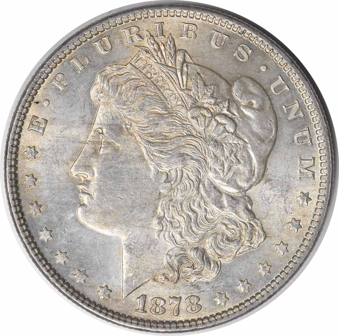 1878 Morgan Silver Dollar 7 Over 8 Tail Feathers Choice BU Uncirculated: 1878 Morgan Silver Dollar 7 Over 8 Tail Feathers Choice BU Uncirculated This is an uncirculated 1878 Morgan Silver Dollar featuring the 7 over 8 Tail Feathers variety. The coin is composed of silver a
