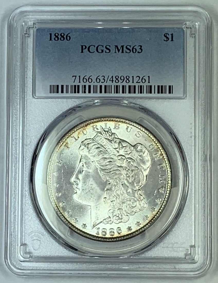 PCGS MS 63 1886 Morgan Silver Dollar Coin Certified Uncirculated: PCGS MS 63 1886 Morgan Silver Dollar Coin Certified Uncirculated This 1886 Morgan Silver Dollar features a denomination of $1 and is certified by PCGS with a grade of MS 63. The coin is uncirculated a