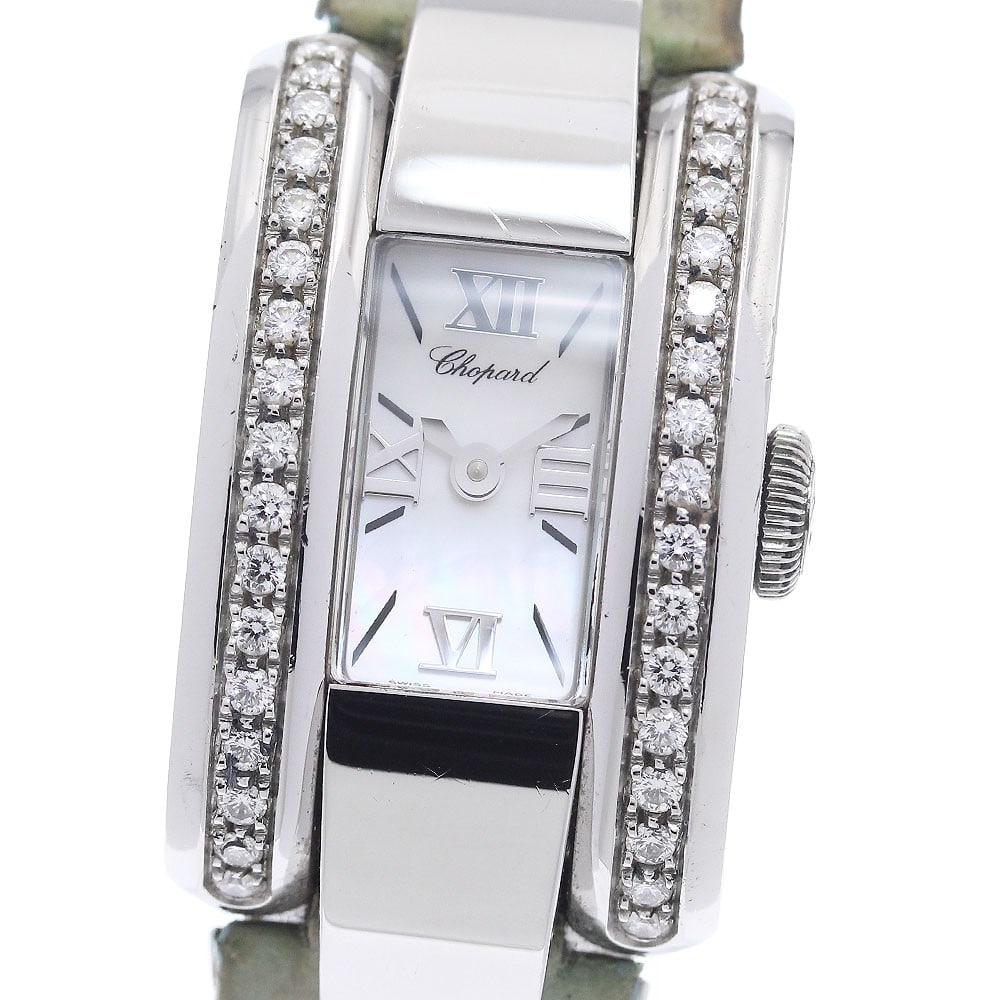 Chopard Lastrada 41/8445-20 Women's Quartz Watch Diamond Bezel: Chopard Lastrada 41/8445-20 Women's Quartz Watch Diamond Bezel This pre-owned Chopard women's wristwatch from the Lastrada line features a diamond bezel and quartz movement. It is a Swiss-made timepie