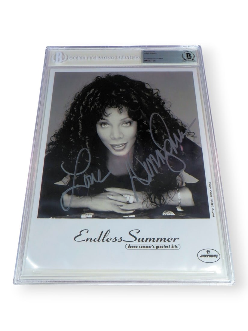 Donna Summer autographed original 8X10 photograph Beckett authenticated: Donna Summer autographed original 8X10 photograph Beckett authenticated Original 8x10 photograph of Donna Summer, signed and authenticated by Beckett Authentication. The item is slabbed and described 