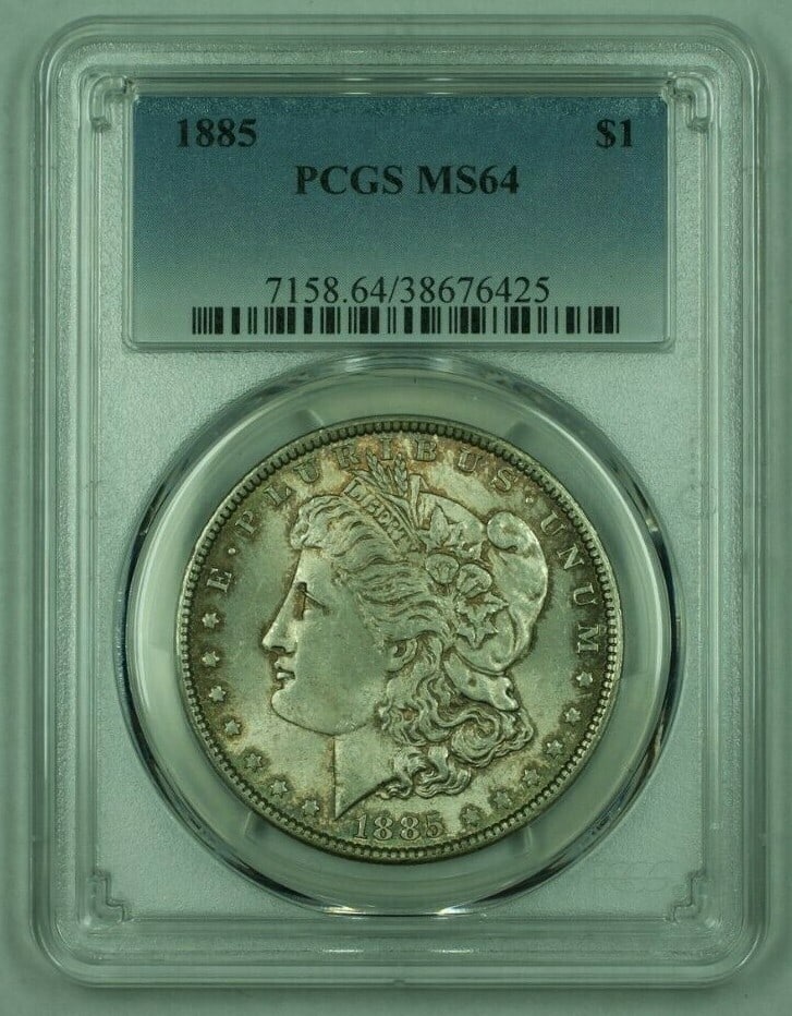 PCGS MS64 1885 Morgan Silver Dollar Philadelphia Mint Toned: PCGS MS64 1885 Morgan Silver Dollar Philadelphia Mint Toned This is an 1885 Morgan Silver Dollar graded MS-64 by PCGS. Struck at the Philadelphia Mint, this uncirculated coin features a silver composi