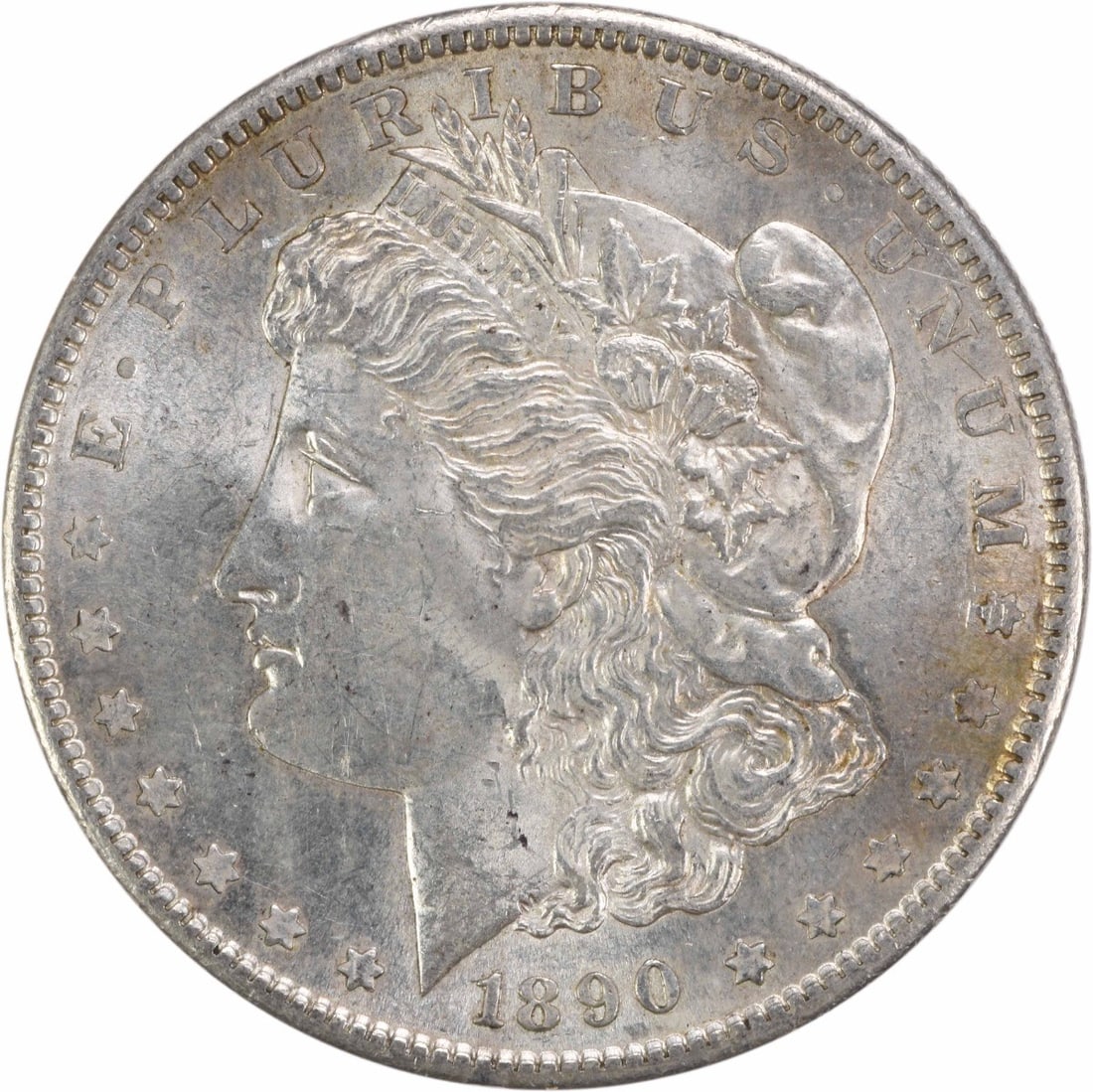 1890-S Morgan Silver Dollar AU Uncertified 90% Silver Coin: 1890-S Morgan Silver Dollar AU Uncertified 90% Silver Coin This 1890-S Morgan Silver Dollar is a captivating piece of history, featuring the iconic design by George T. Morgan. It is classified as an A