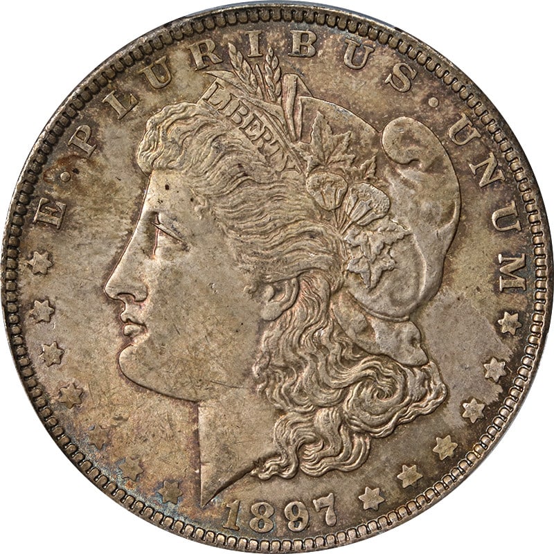 PCGS MS64 1897 P Morgan Silver Dollar Toned: PCGS MS64 1897 P Morgan Silver Dollar Toned This is an 1897 Morgan Silver Dollar from the Philadelphia Mint, graded MS64 by PCGS. The coin is uncirculated and features attractive toning. It is compose