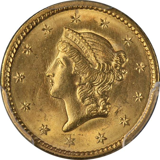 1849 P Liberty Gold Dollar Type 1 Open Wreath PCGS MS64: 1849 P Liberty Gold Dollar Type 1 Open Wreath PCGS MS64 An 1849-P Type 1 Liberty Gold $1 Open Wreath coin graded PCGS MS64. It is described as uncirculated with great eye appeal, fantastic luster, a n