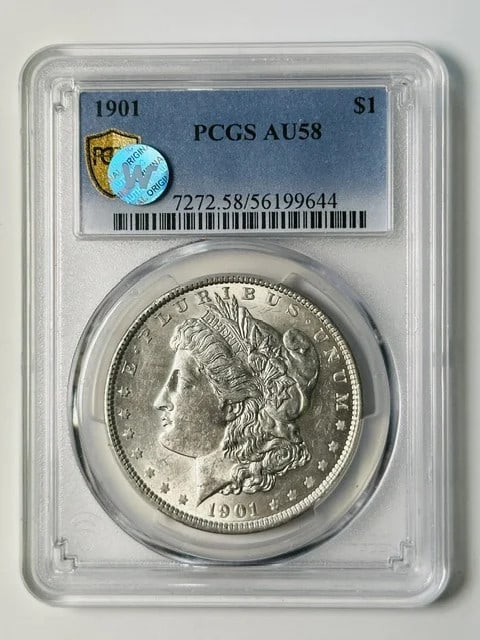 1901 Morgan Silver Dollar PCGS AU58 Philadelphia: 1901 Morgan Silver Dollar PCGS AU58 Philadelphia This 1901 Morgan Silver Dollar is graded AU-58 by PCGS, indicating attractive, lightly circulated condition. Struck at the Philadelphia Mint, this coin