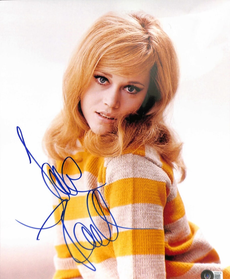11x14 Photo Autographed by Jane Fonda with Beckett Authentication: 11x14 Photo Autographed by Jane Fonda with Beckett Authentication This 11x14 photograph features the autograph of renowned actress Jane Fonda, signed in blue permanent marker. The signature is certifi