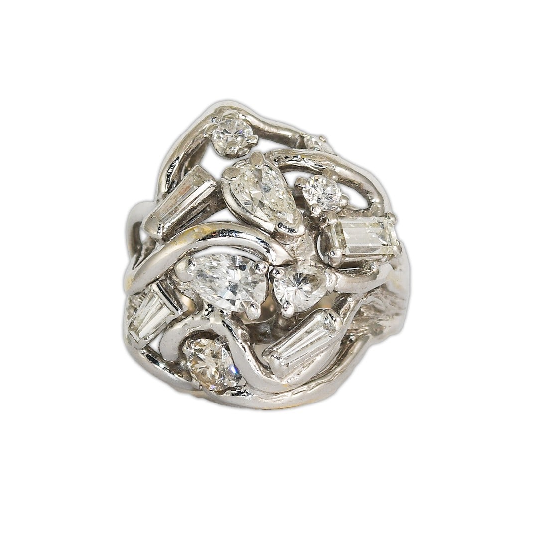 14k White Gold Pear Round Baguette Diamond Ring Size 7.25: 14k White Gold Pear Round Baguette Diamond Ring Size 7.25 This vintage cocktail ring features an open-work design crafted in 14k white gold. The ring is adorned with a mix of natural diamonds in pear,
