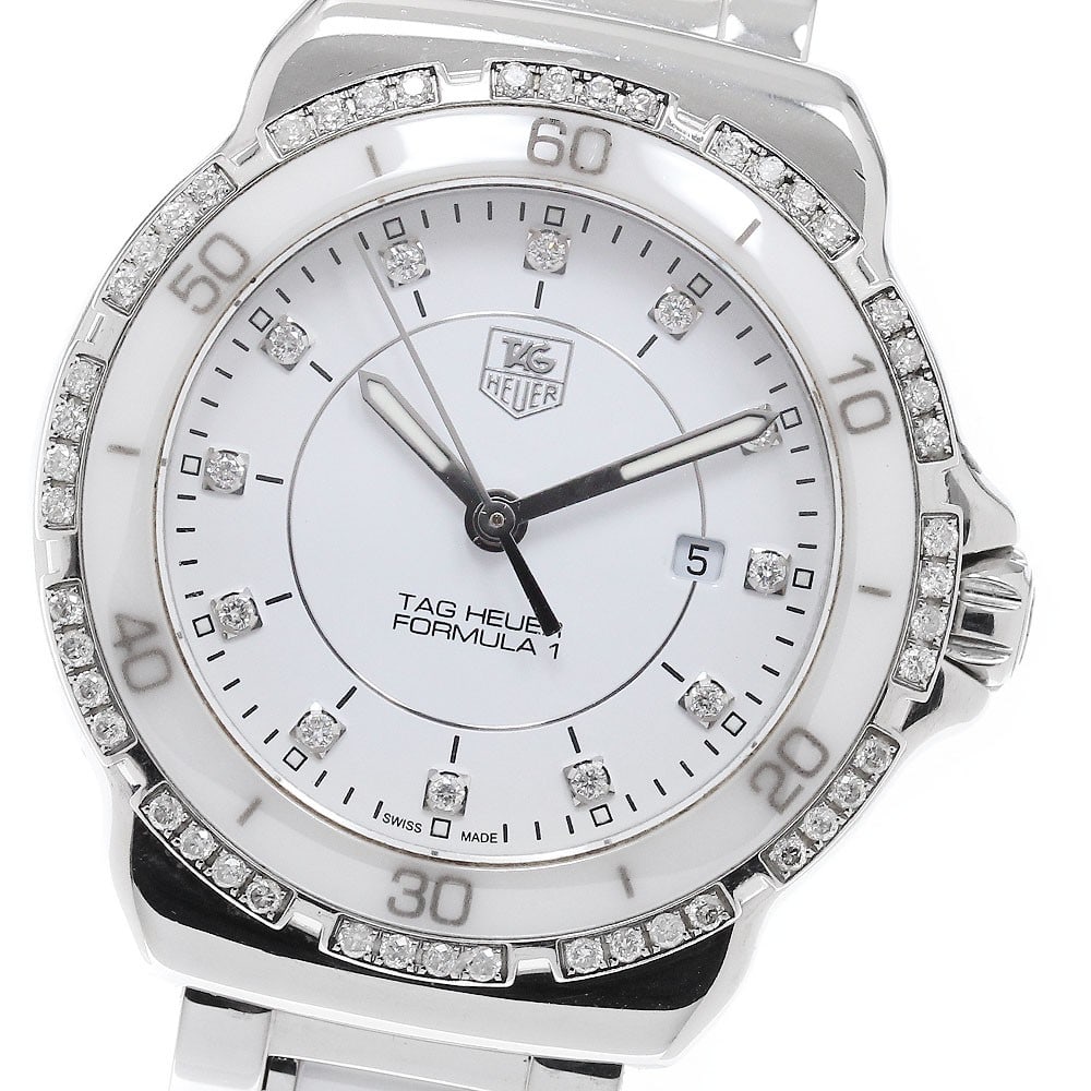 TAG HEUER Formula 1 Diamond Bezel Quartz Women's Wristwatch WAH1313: TAG HEUER Formula 1 Diamond Bezel Quartz Women's Wristwatch WAH1313 This TAG Heuer Formula 1 WAH1313 women's wristwatch features a diamond bezel and operates with a quartz movement. Manufactured in Sw